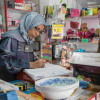 Iman, a 38-year-old Syrian woman from JordanÕs Al-Mafraq governorate is a beneficiary of the ÔSpring Forward for WomenÕ project. She benefited from one of the revolving loans provided by UN Women and was able to fund her small home appliances shop. Spring Forward for Women (SFW) is an initiative implemented by UN Women country offices across the Southern Mediterranean region, funded by the European Union. The primary focus of the project is to encourage the effective participation of marginalized women in economic and public life by addressing the barriers that have impeded their engagement in these areas. The project has targeted four areas within JordanÕs Al Mafraq Governorate, an area north-east of Amman where womenÕs unemployment and poverty rates are particularly high and further perpetuated by the presence of Syrian refugees.
Photo: UN Women/Christopher Herwig